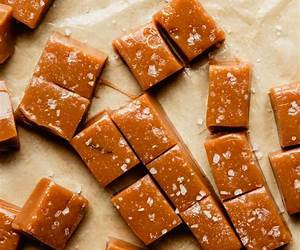 Salted Caramel, Shows, and Suspects (A Chocolate Centered Cozy Mystery Book 23)